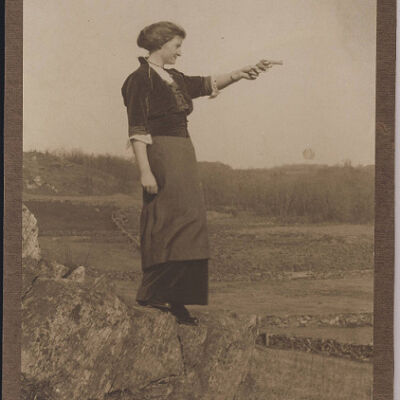 Sarah Miller holding a gun