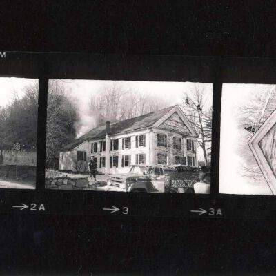 Proof sheet of photos of fire in Historical Hall