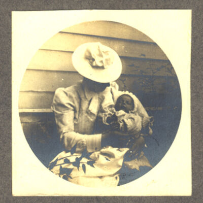 unidentified woman holding baby