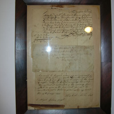 Framed letter in three parts.