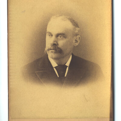 unidentified mustachioed man