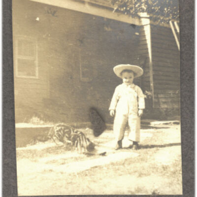 unidentified child outside house