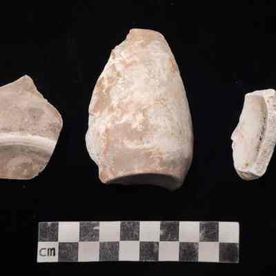 White-bodied refined earthenware clay biscuits of tea/coffee cups at 253 Carondelet Walk.