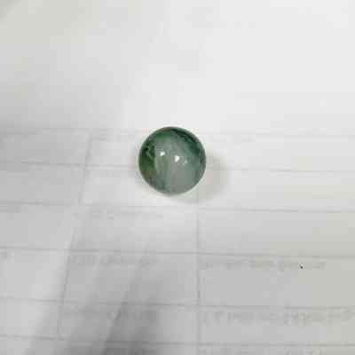 Green and White Glass Marble