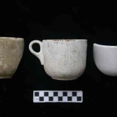 Irregular White-Bodied Refined Earthenware at 253 Carondelet Walk