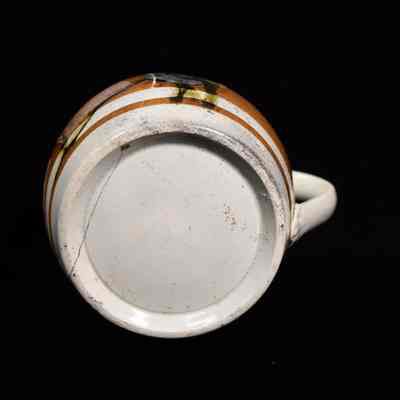 Blank, cream base. No maker markings.