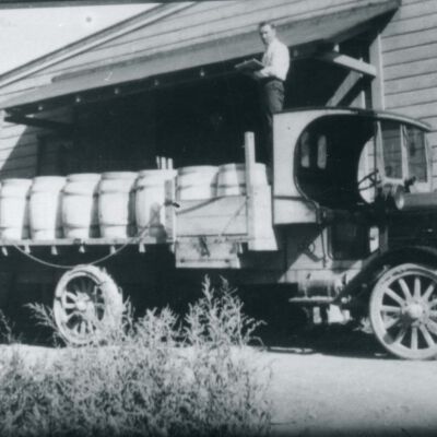 Truck with barrels.