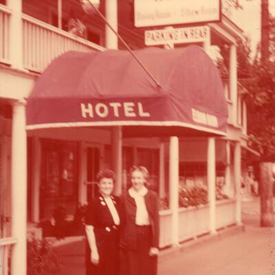 Olive Laib with another woman in front of Red Hook Hotel, c 1950
