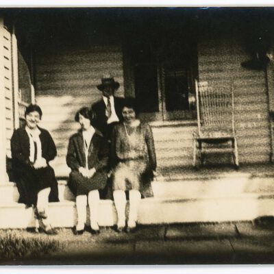 Ladies and a Man on a Porch