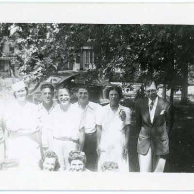 Staff posing behind Red Hook Hotel