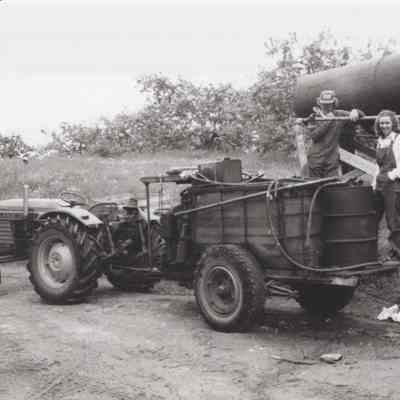 Chuck Mead and first wife, Karen, spray equipment