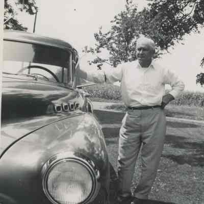 William Redder Standing with Car, 1951