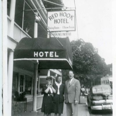 Olive and Howard Laib with another woman in front of Red Hook Hotel, 1950