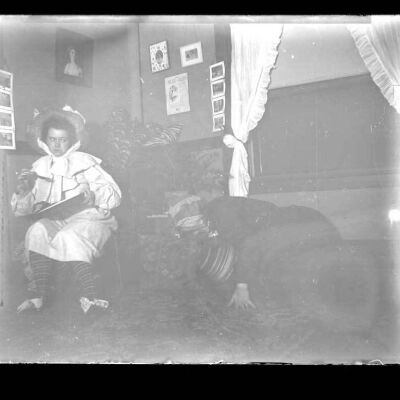 "Little Miss Muffet" Woman sitting in room