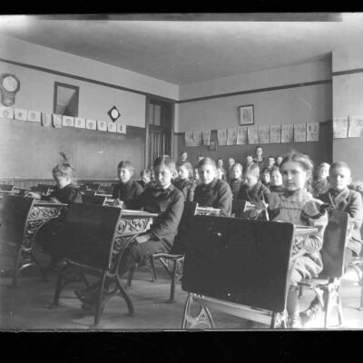 Interior elementary school with pupils