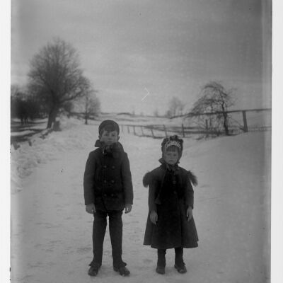 Roscoe & Marion Teator standing in snowy road