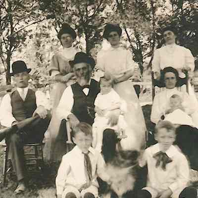 Brenzel family posing on lawn