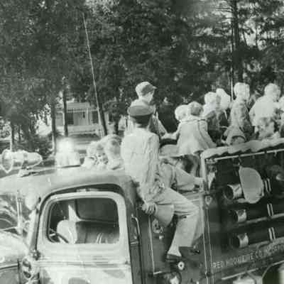 Children Riding a Fire Truck
