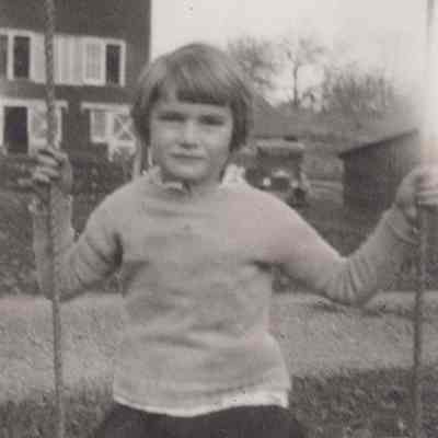 Elizabeth Mead on a swing, 1929