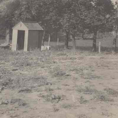 Building (tool shed?) in a field
