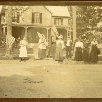 Women watching parade on South Broadway, c 1900