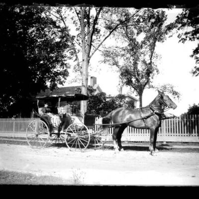 Surrey, 2 horses, passengers in front of Martin-Cookingham House
