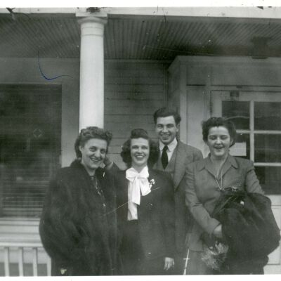 Olive Laib and friends in front of hotel, 1946