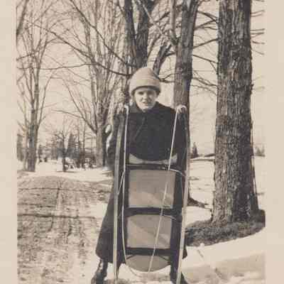 Alice Arnold Fraleigh with sled, 1916