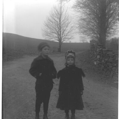 Marion and Roscoe Teator standing in a road