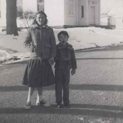 Cheryl and Craig standing in front of a church