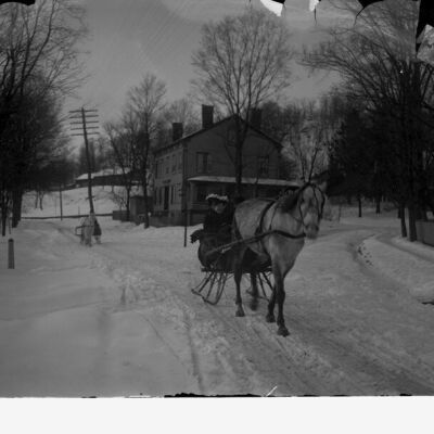 Upper Red Hook intersection, two horse-drawn sleighs in snow