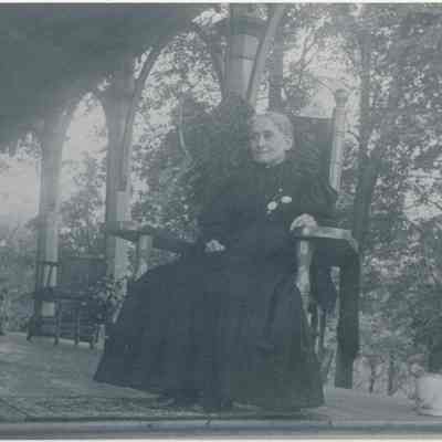 Cordelia Jackson on porch of Rose Hill Farm