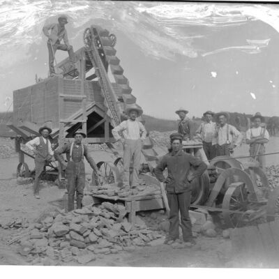 Men with stone crusher
