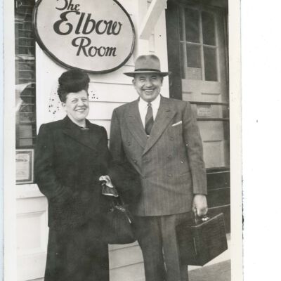 Couple outside Red Hook Hotel Elbow Room, 1949