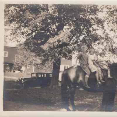 Mead children on horseback
