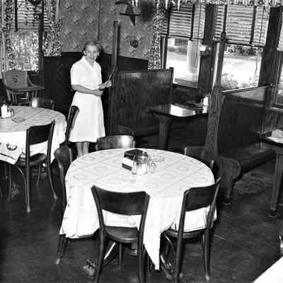 Reese's Bar Dining Area with Waitress