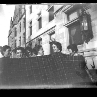 "Behind the steamer rug" 6 young ladies