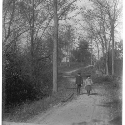 Roscoe & Marion Teator walking on winding road