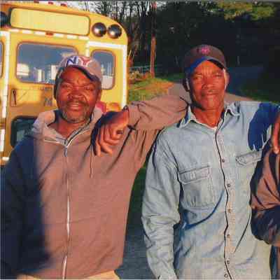 Three workers at Mead Orchards Farm