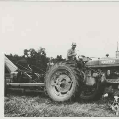 Peter Bulkeley on tractor, 1950s