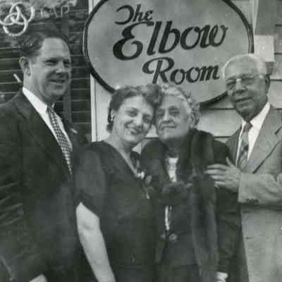 Howard and Olive Laib with couple outside Red Hook Hotel