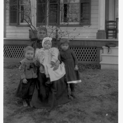 Mrs. L. Dutcher with Sandy Drum's children