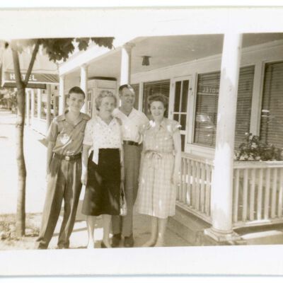 Howard and Olive Laib with two others in front of Red Hook Hotel