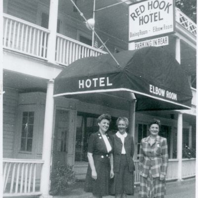Olive Laib with two women in front of Red Hook Hotel, c 1950