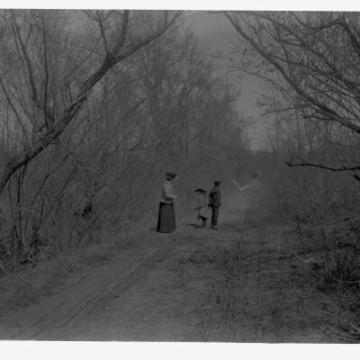 Nena, Roscoe and Marion Teator standing in lane