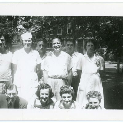 Staff posing behind Red Hook Hotel, 1946