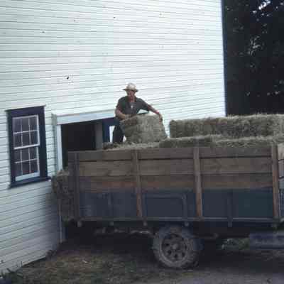 Unloading Baled Hay