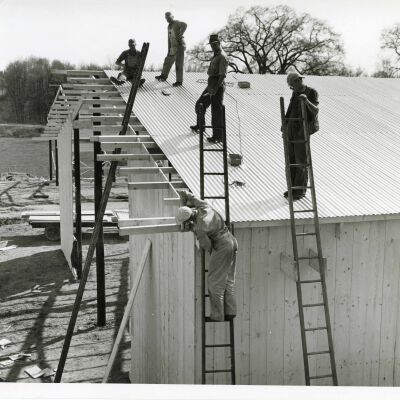 Workers Finishing Roof
