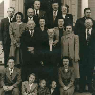 Henry and Mary Brenzel posing with family