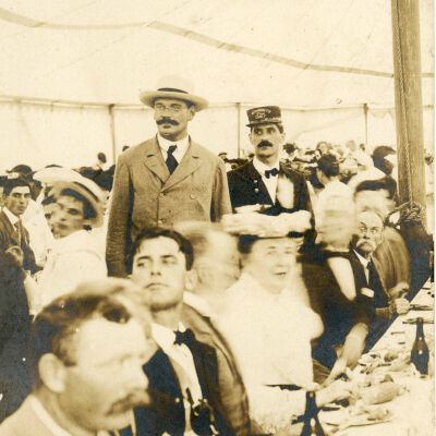 Robert Chanler and Others partying under a tent